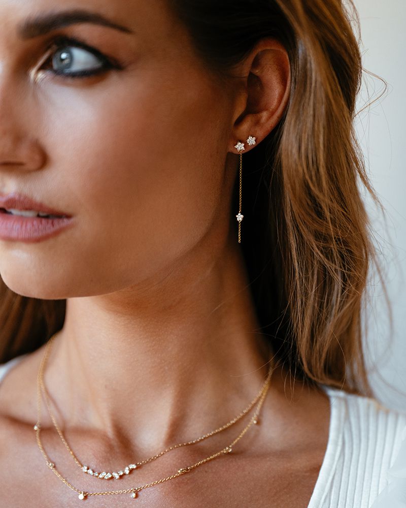 Boucles d'oreilles en or jaune ludiques avec étoiles filantes et diamants de 0,24 crt