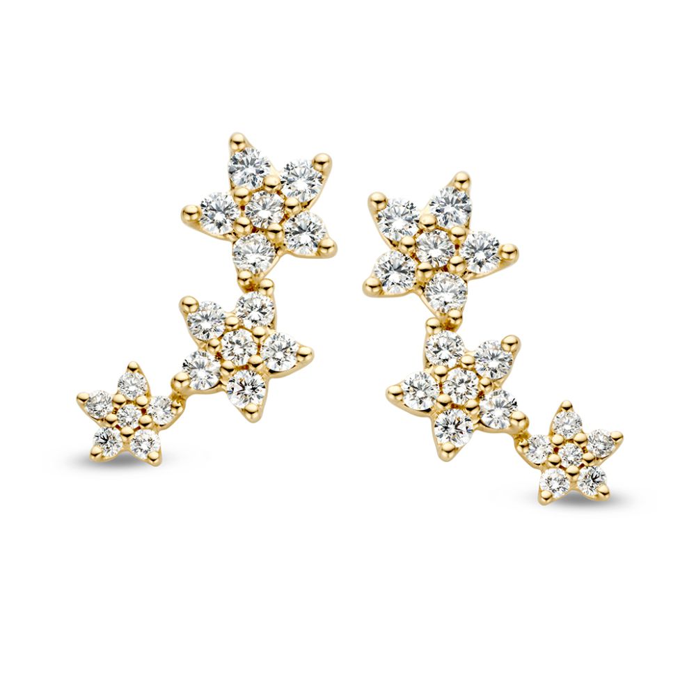 Boucles d'oreilles en or jaune avec trois étoiles ornées de diamants, totalisant 1,05 crt.