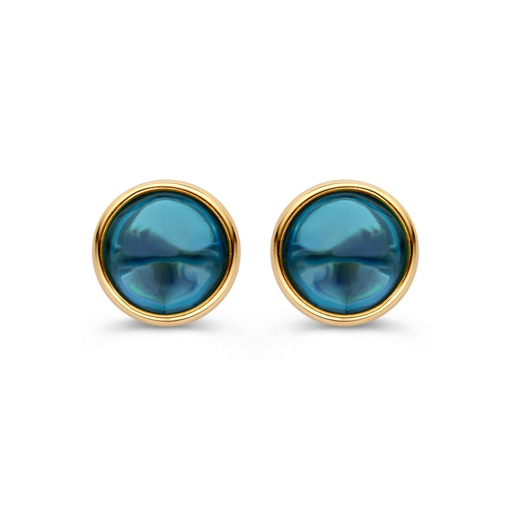 Boucles d'oreilles en or jaune avec des topazes, de forme ronde et finition brillante.