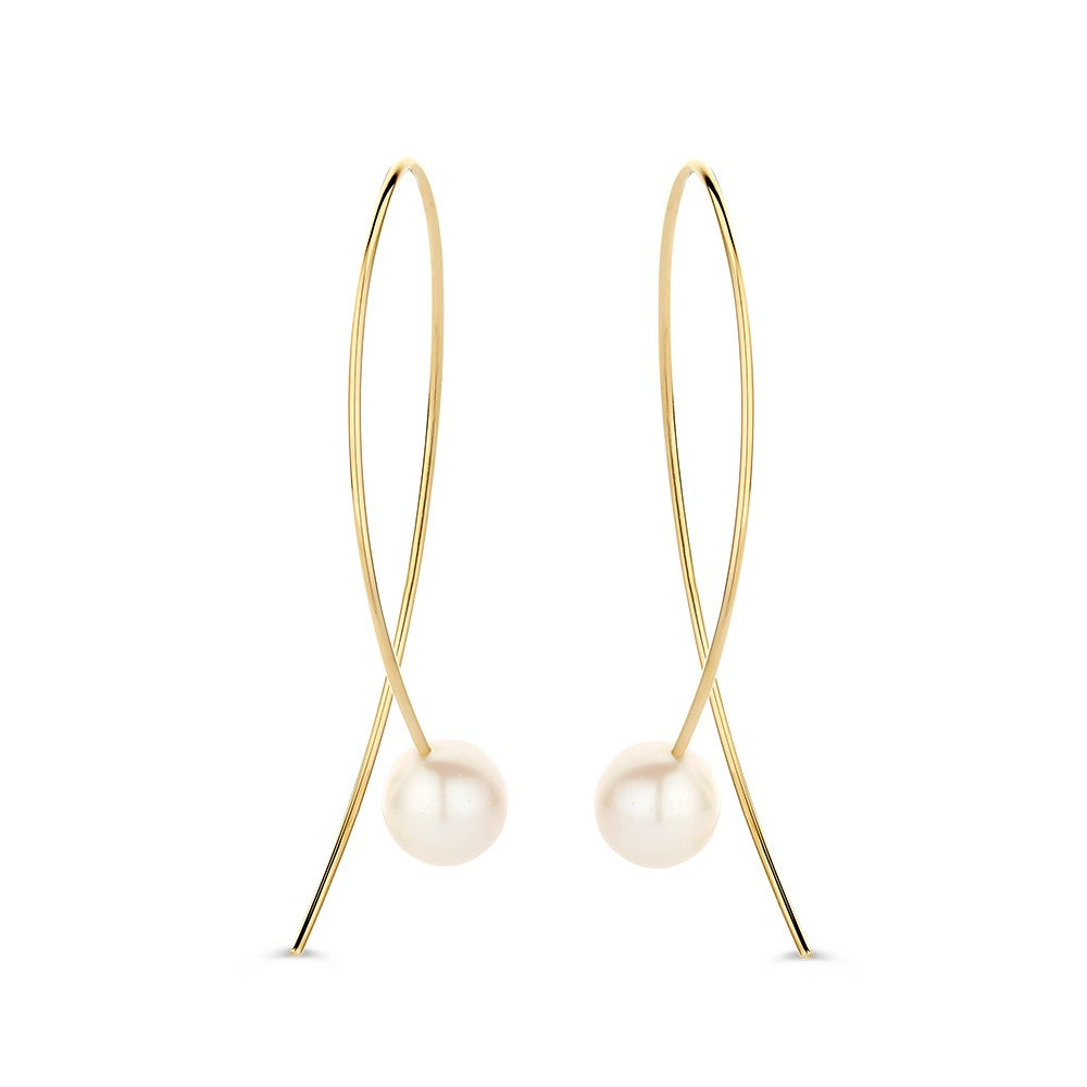 Boucles d'oreilles en or jaune 14 carats avec de grandes perles.