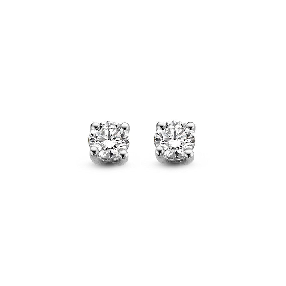 Boucles d'oreilles en or blanc avec des diamants de 0,20 carat.