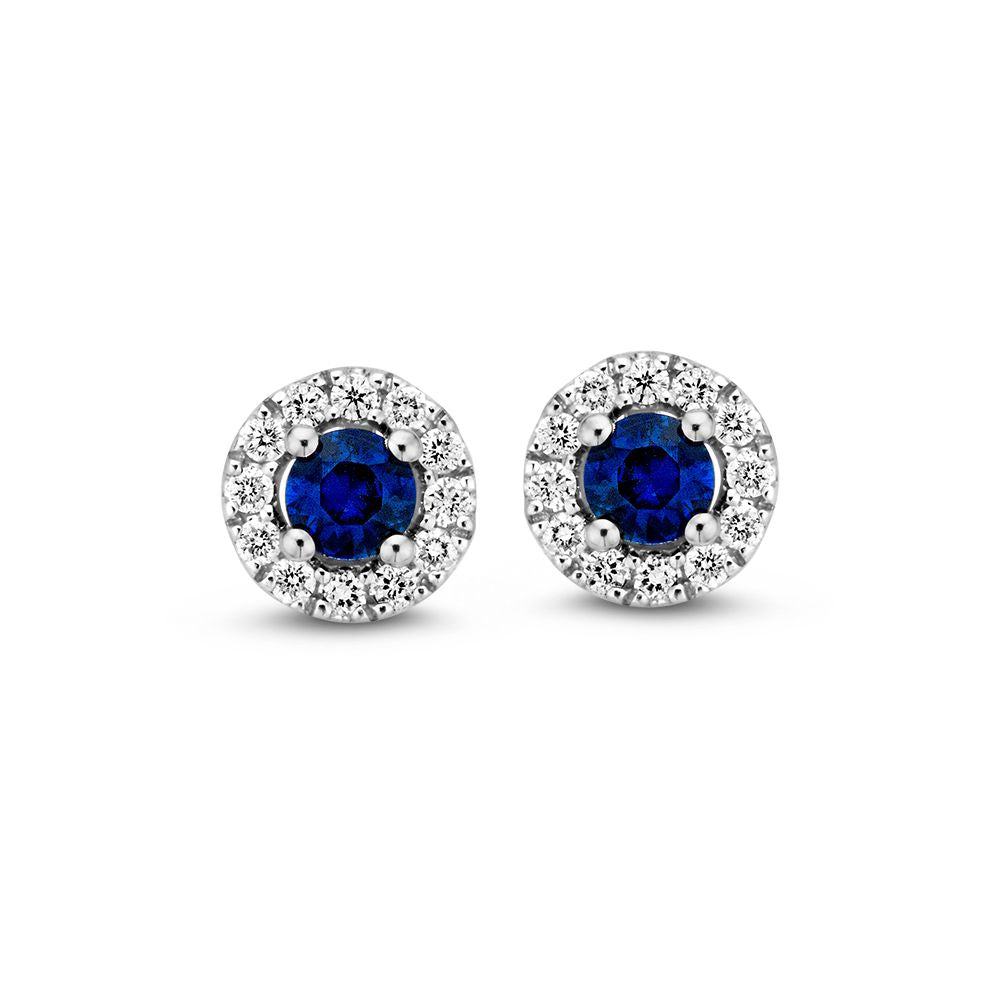 Boucles d'oreilles en or blanc avec saphir et diamant, serties de brillants.