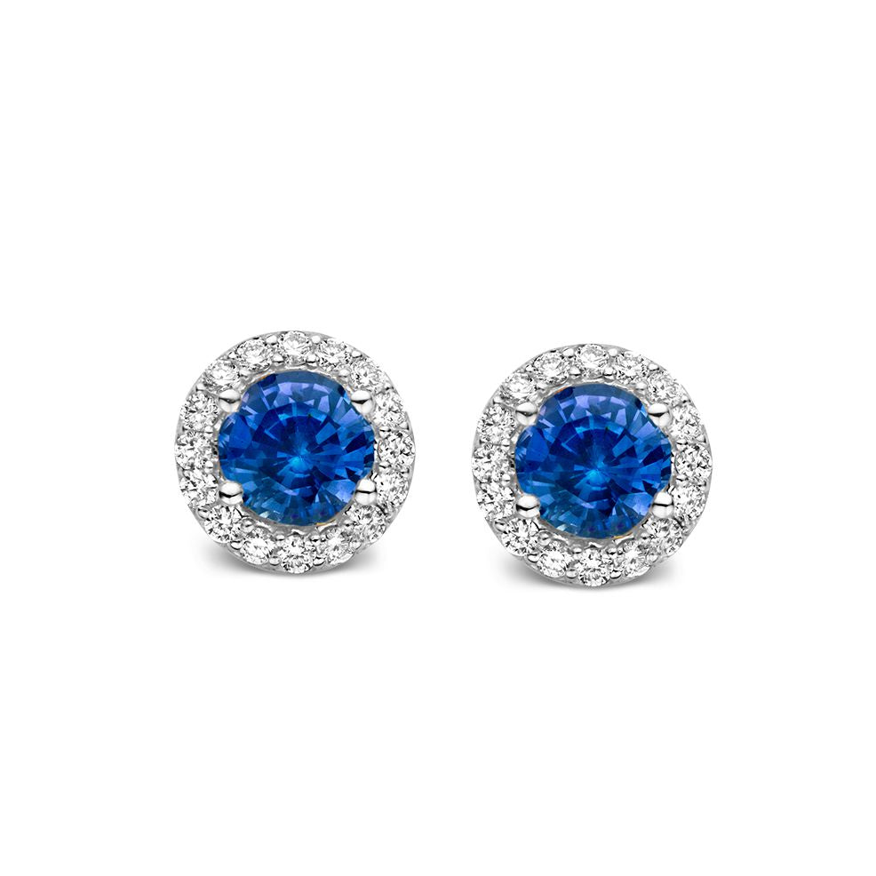 Boucles d'oreilles en or blanc 18 carats avec saphirs bleus et diamants, forme ronde.
