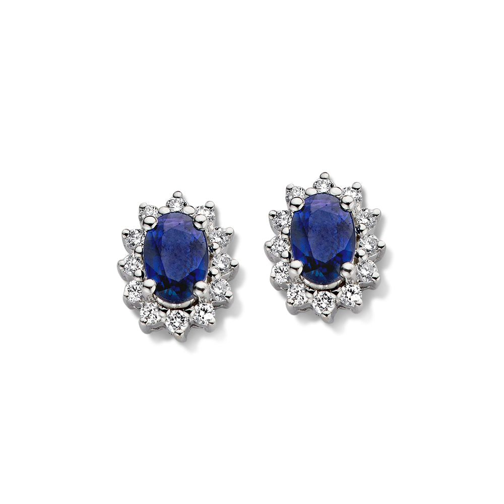 Boucles d'oreilles en or blanc avec saphirs entourés de diamants, forme ovale.