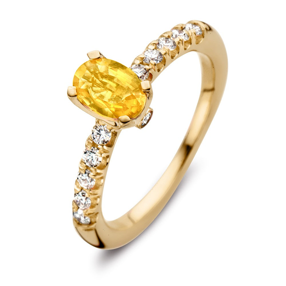 Bague en or jaune 18 carats avec saphir jaune ovale et diamants de 0,54 ct.