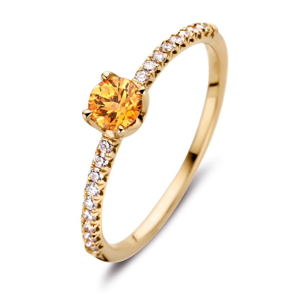 Bague en or jaune 18 carats ornée d'un saphir orange et de diamants de 0,15 ct.