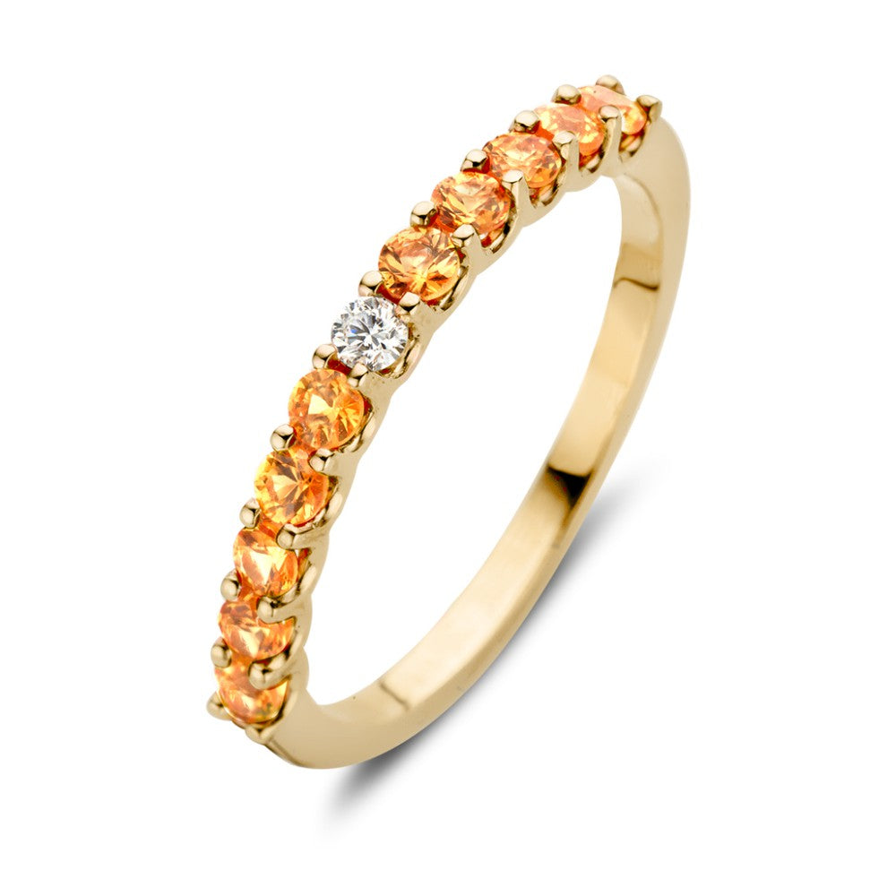 Bague en or jaune 18 carats ornée de saphirs orange et d'un diamant blanc.