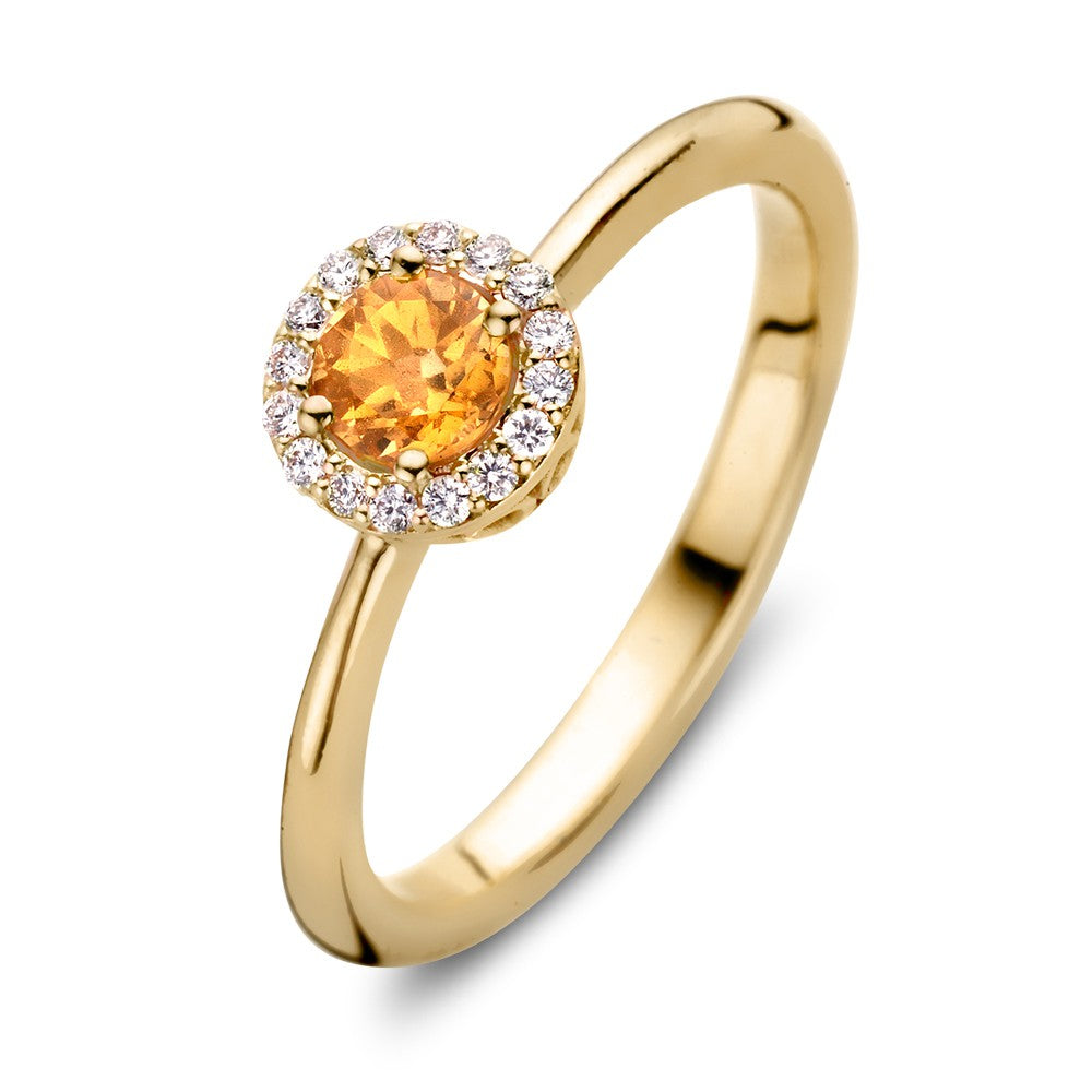 Bague en or jaune 18 carats avec un saphir orange et des diamants de 0,11 ct.