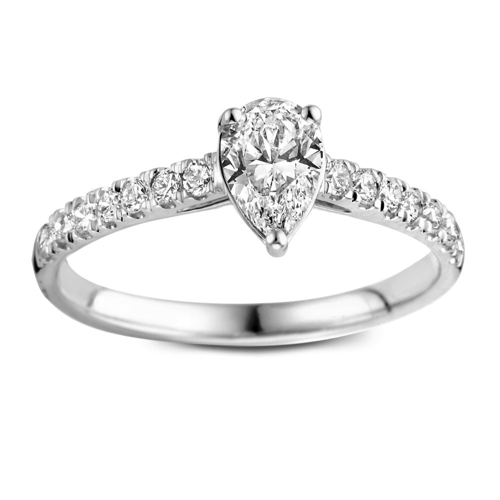 Bague en or blanc avec un diamant en forme de poire et des diamants brillants sur le band.