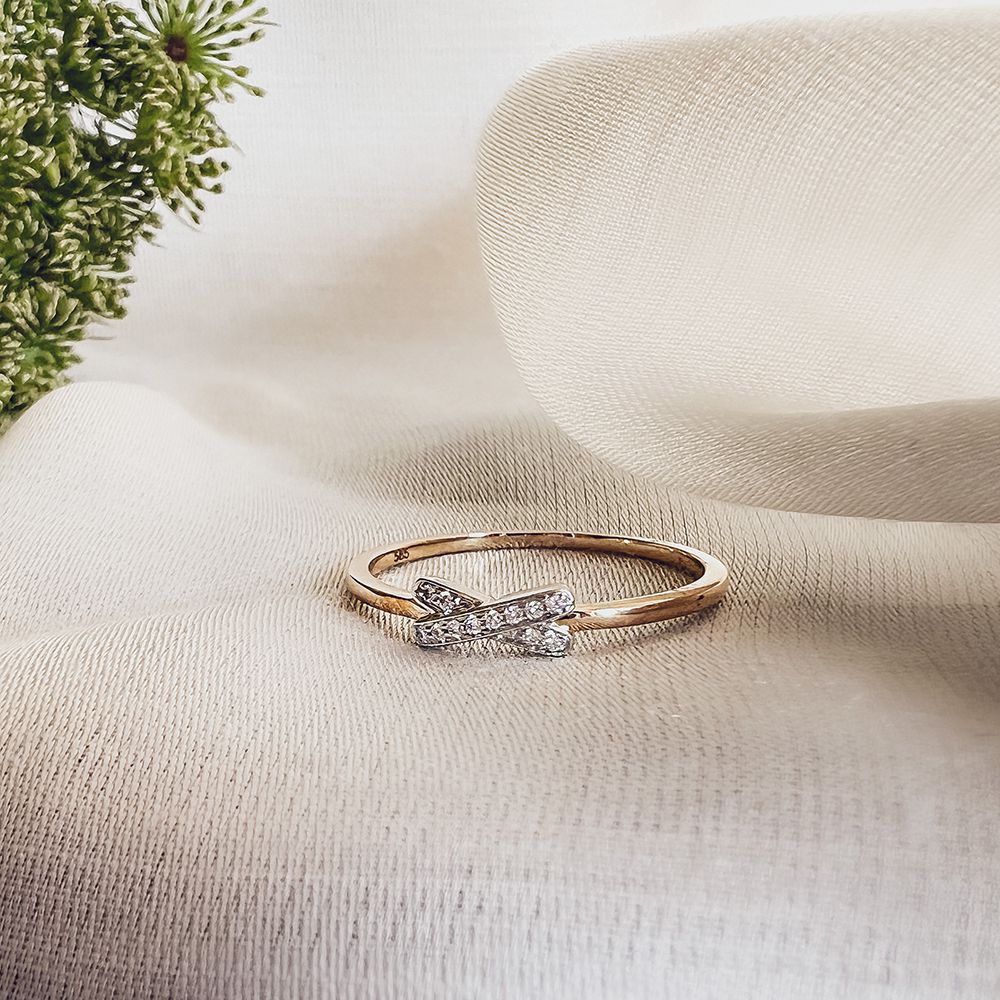 Bague en or bicolore 14 carats avec diamant design X