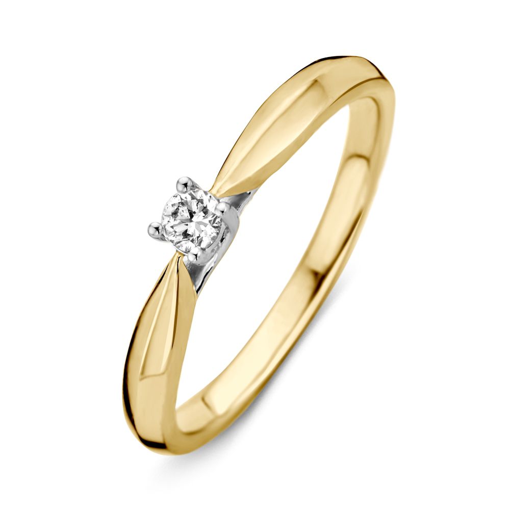 Bague en or bicolore 14 carats avec un diamant taillé en brillant.
