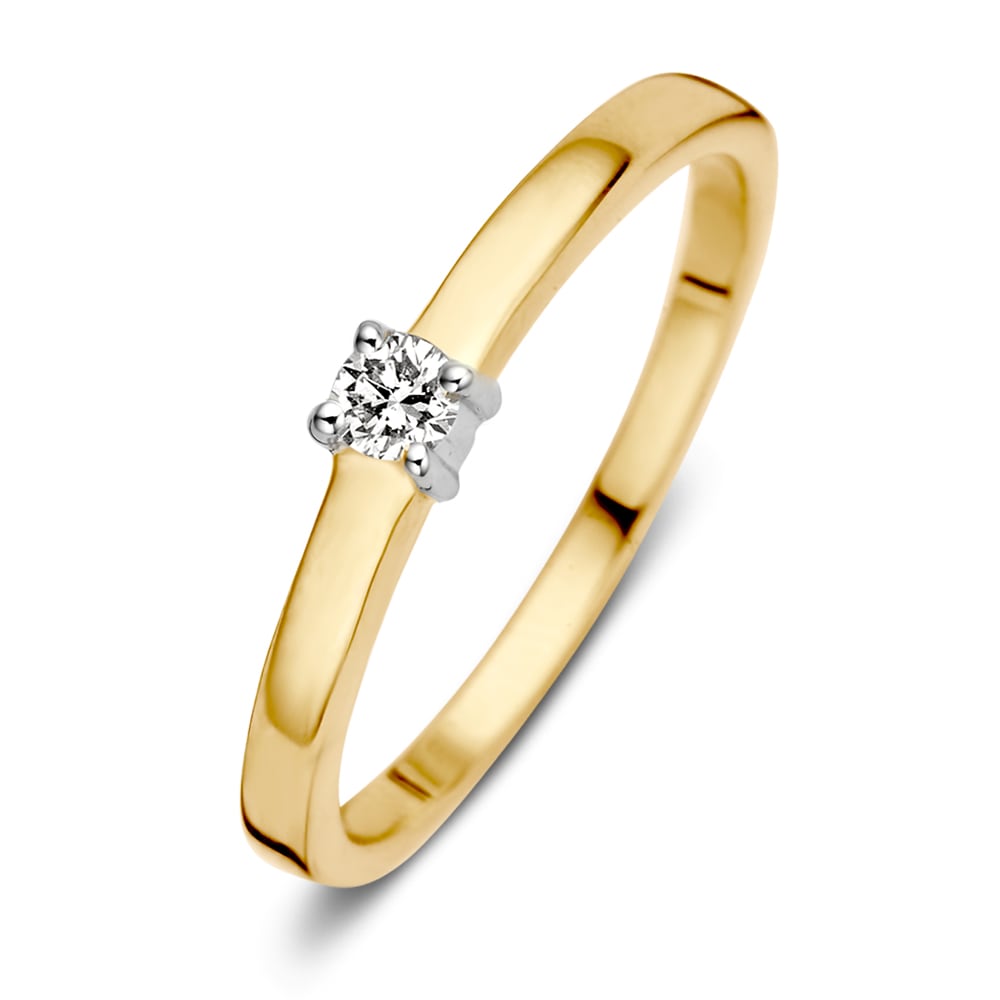 Bague en or bicolore 14 carats avec diamant taillé en brillant.