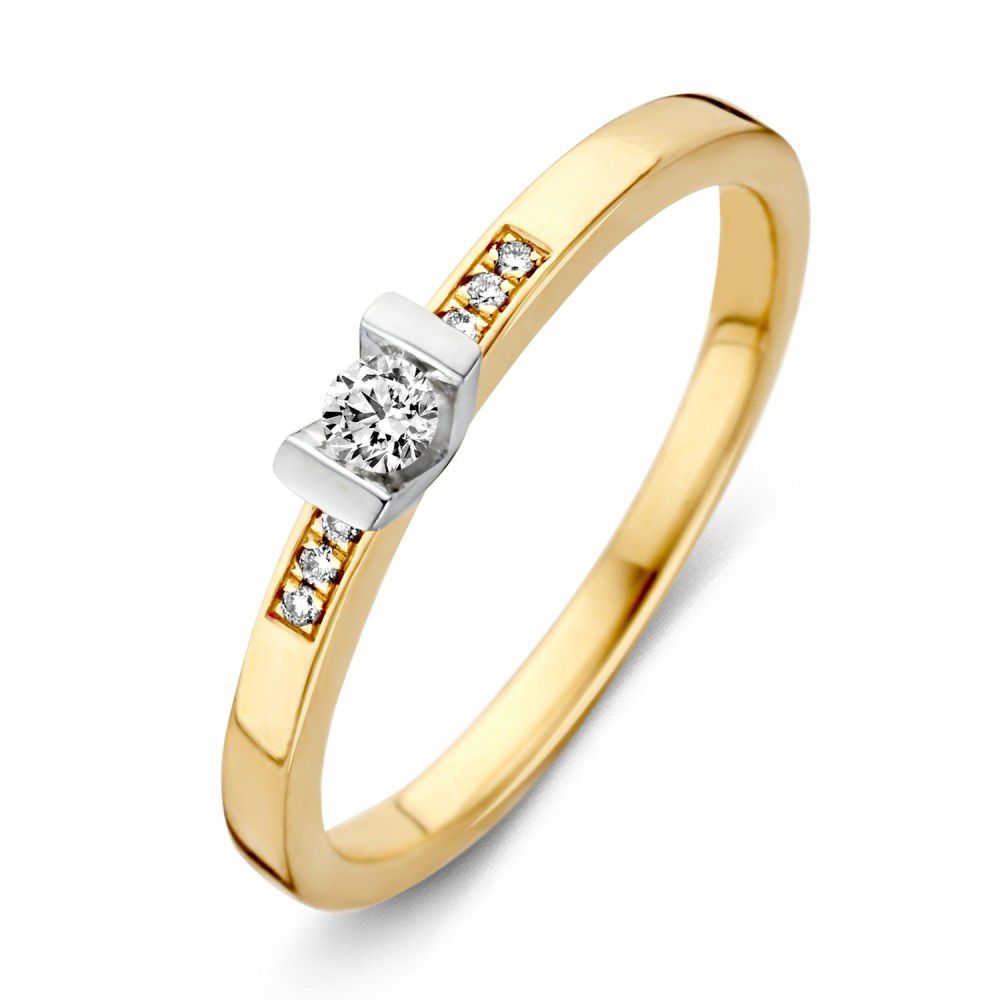 Bague en or bicolore 14 carats avec diamants taillés en brillant.