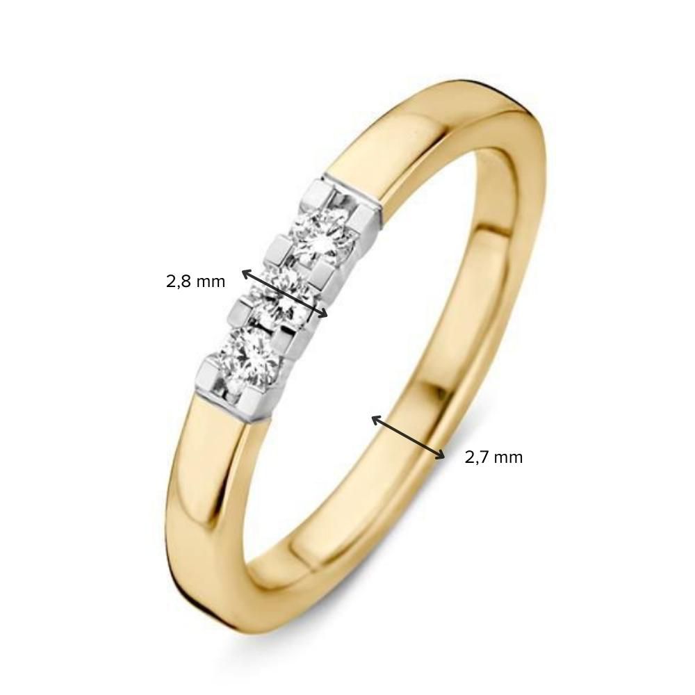 Bague pour femme bicolore en or blanc et or jaune avec trois diamants 0.15 crt.