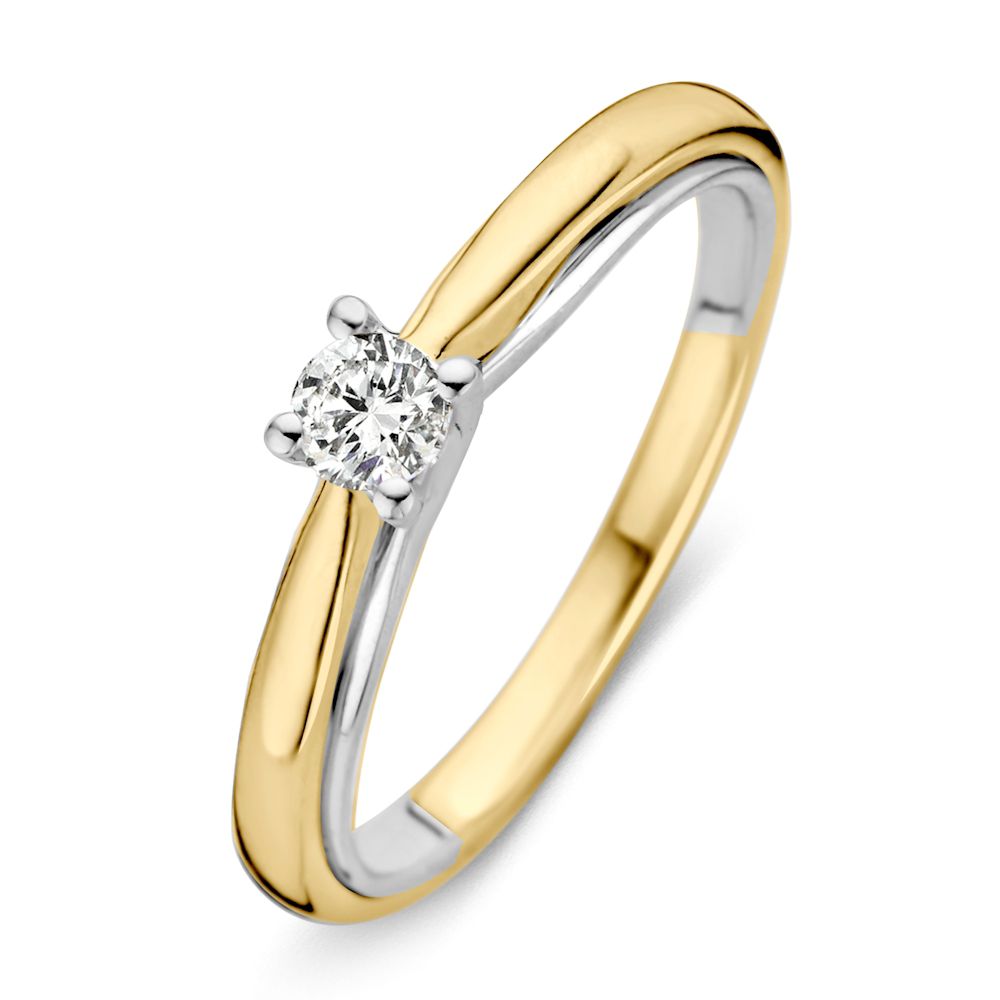Bague bicolore en or jaune et blanc avec un brillant de 0,19 ct.