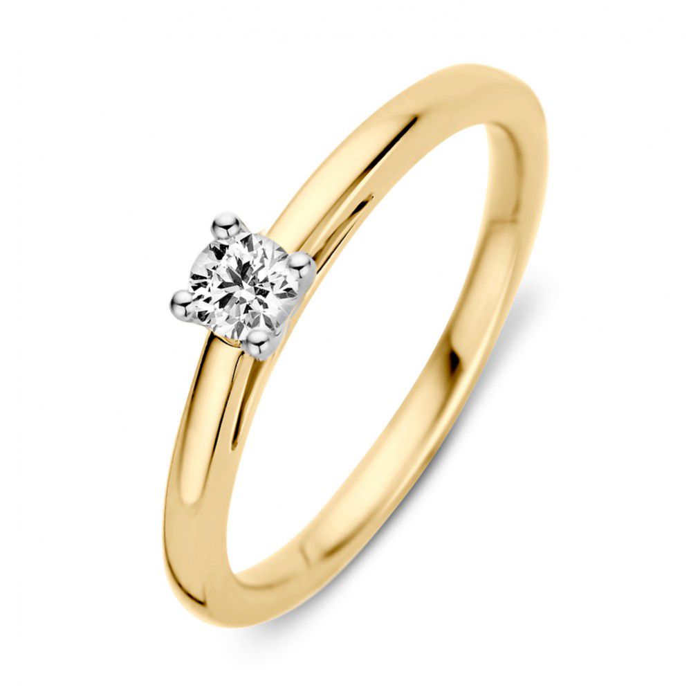 Bague en or jaune et blanc avec un brillant de 0,19 ct.