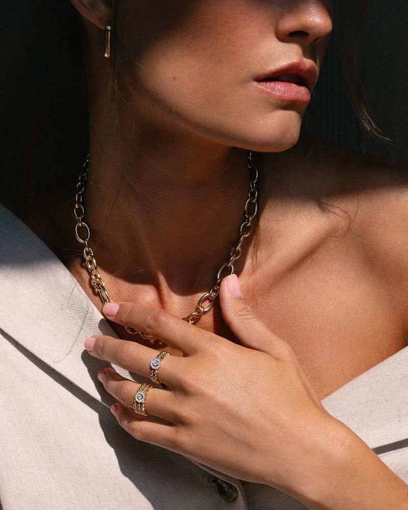 Bague en Or Élégante avec Diamants et Double Rangée de Boules en Or 0.19 crt.