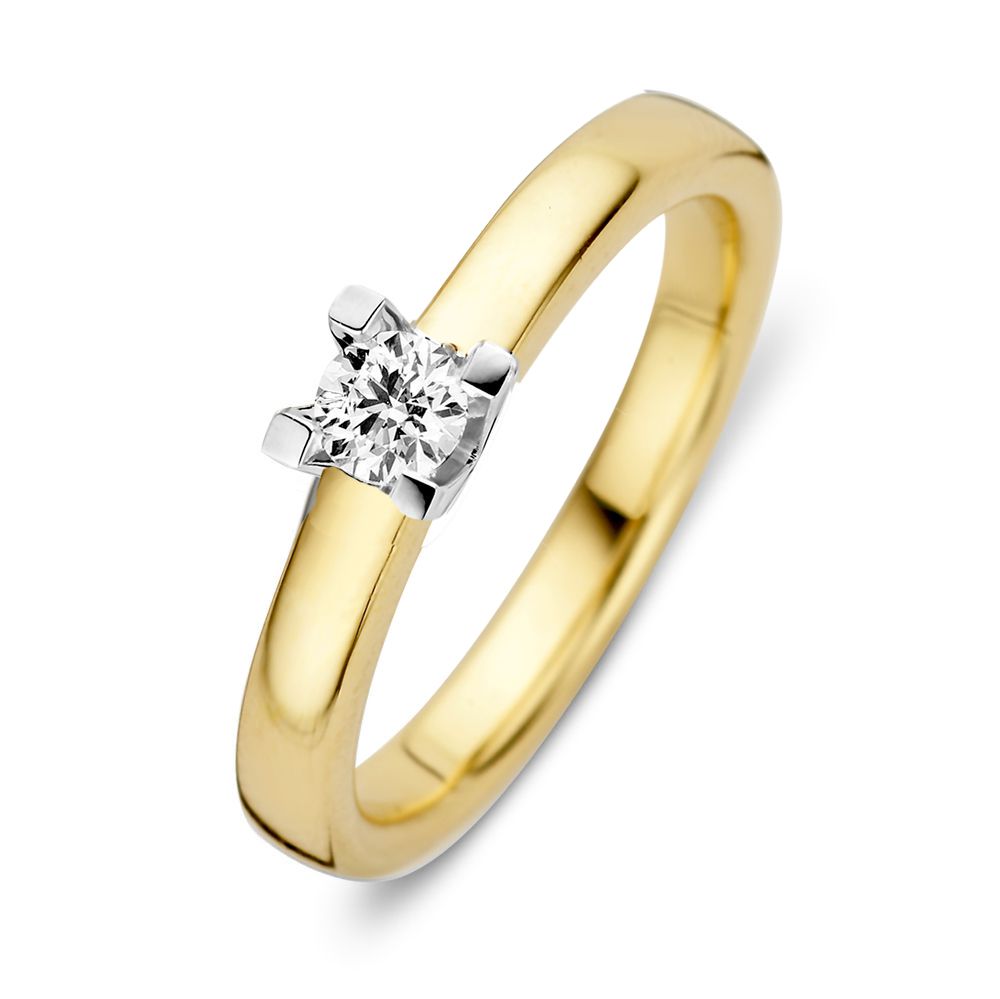 Bague bicolore avec un brillant de 0,19 ct, en or jaune et blanc.
