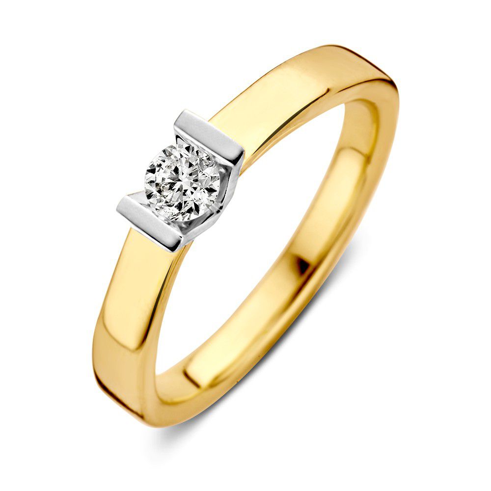 Bague en or bicolore avec un brillant de 0,20 carat.