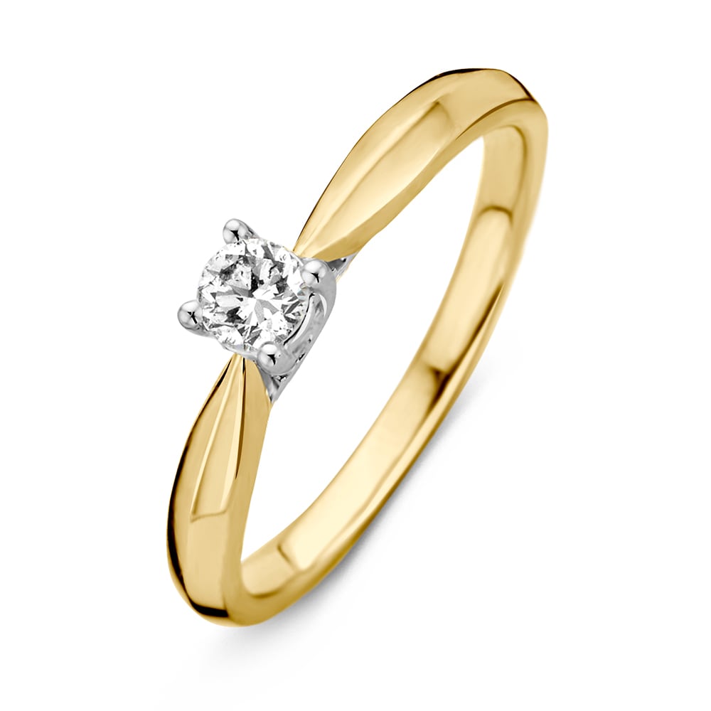 Bague en or jaune et blanc avec un diamant de 0,24 ct.