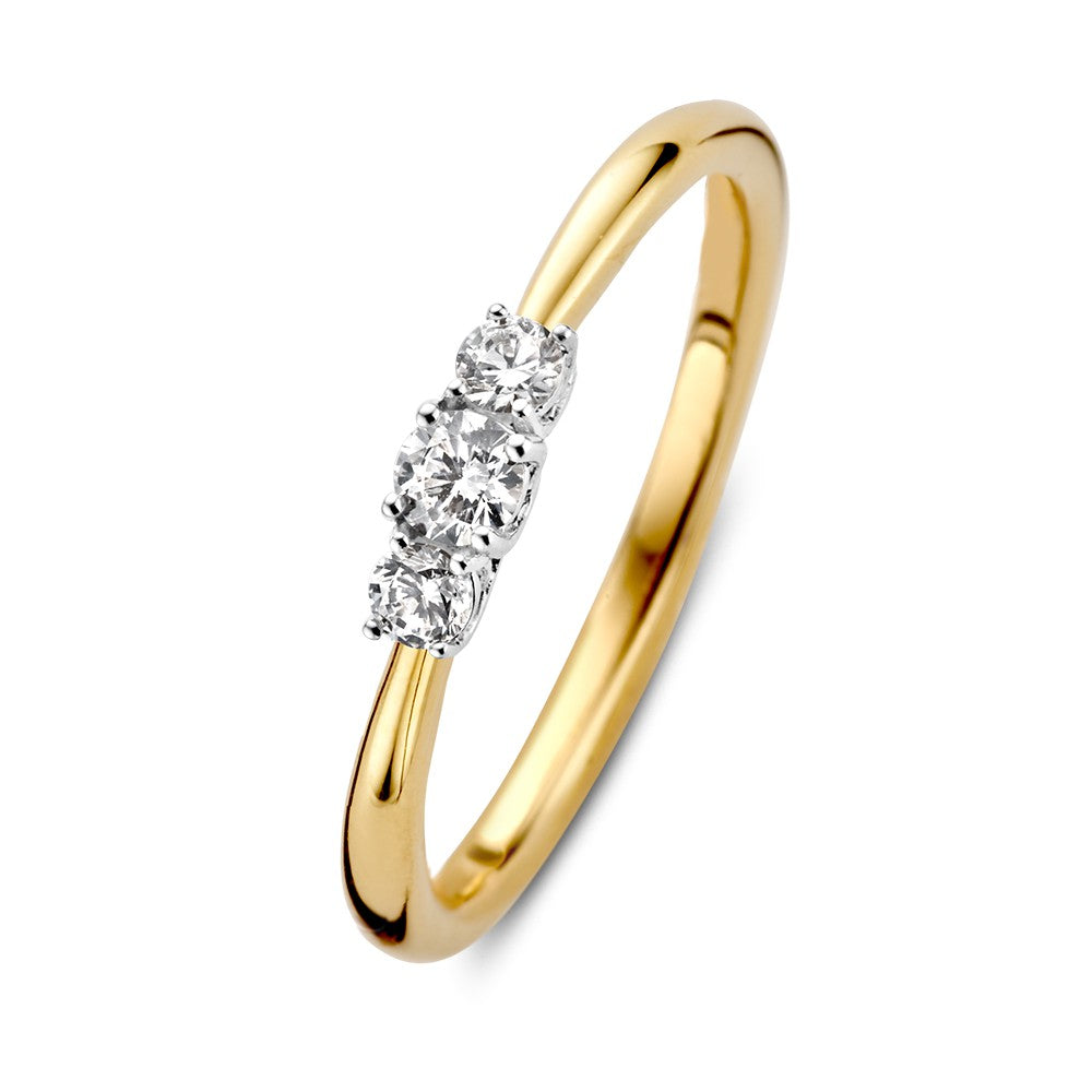 Bague bicolore élégante avec trois diamants, sertie de 0,24 ct.