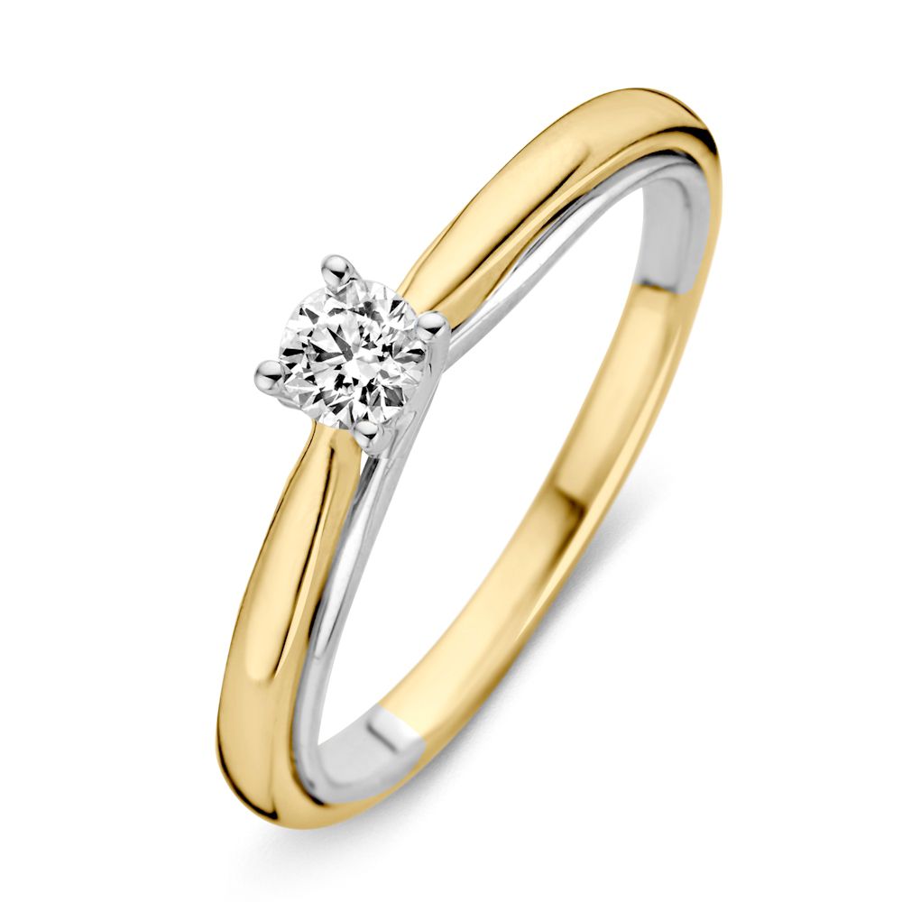 Bague en or jaune et blanc avec un diamant brillant de 0,25 carat.