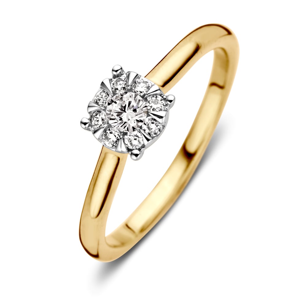 Bague en or jaune bicolore avec un diamant de 0,25 carat, serti en couronne.
