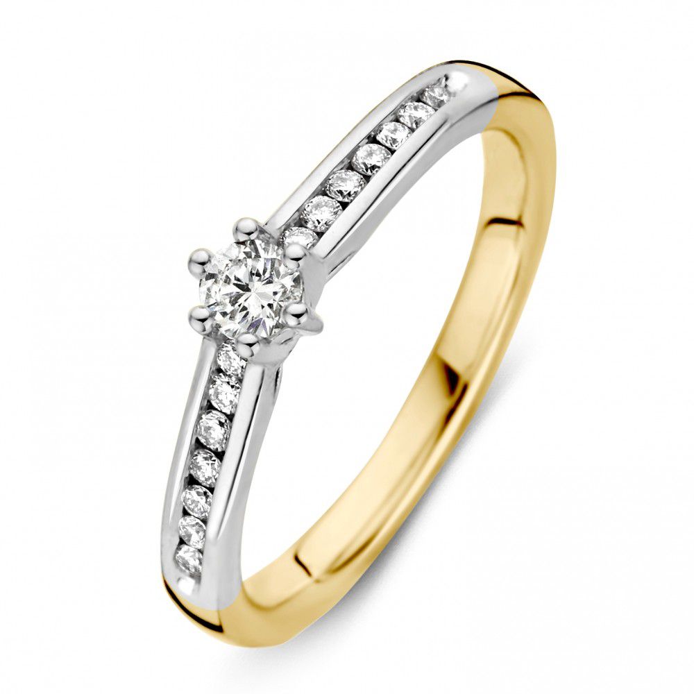 Bague bicolore en or jaune et blanc avec un brillant de 0,30 ct et des pierres scintillantes.