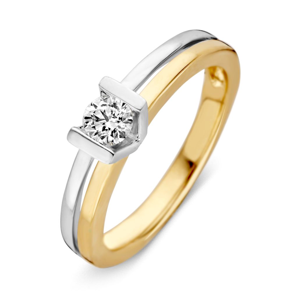 Bague bicolore en or jaune et blanc avec un diamant de 0,30 ct, design épuré, 14 carats.