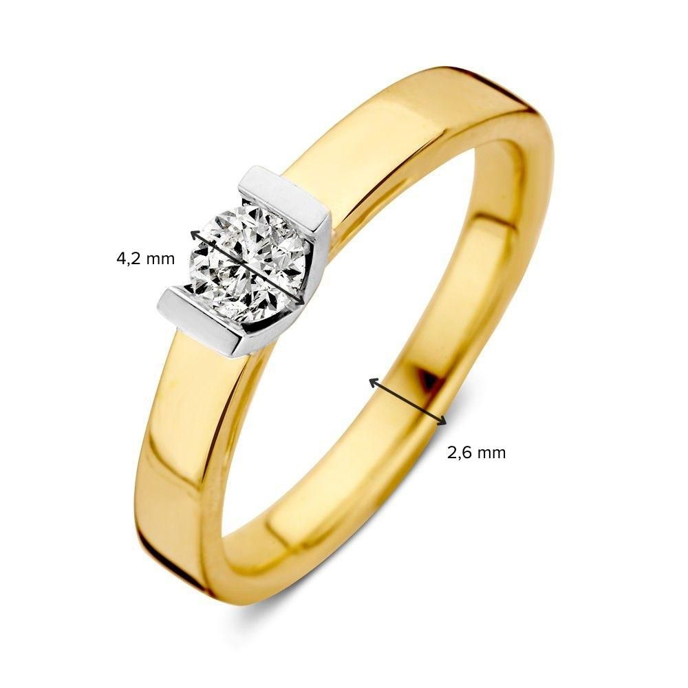 Bague solitaire bicolore en or blanc et or jaune avec pierre précieuse taillée en brillant de 0,30 crt