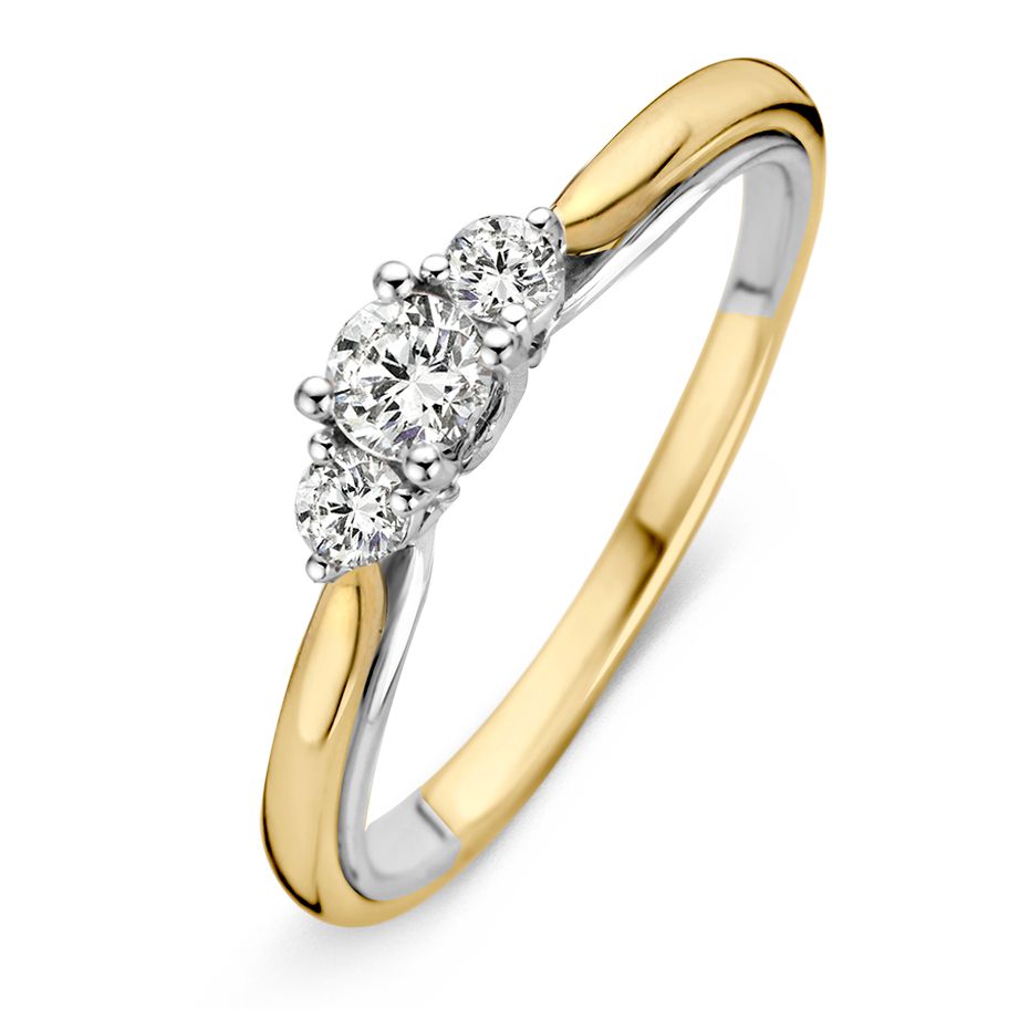 Bague bicolore en or jaune et blanc avec trois diamants brillants de 0,31 ct.