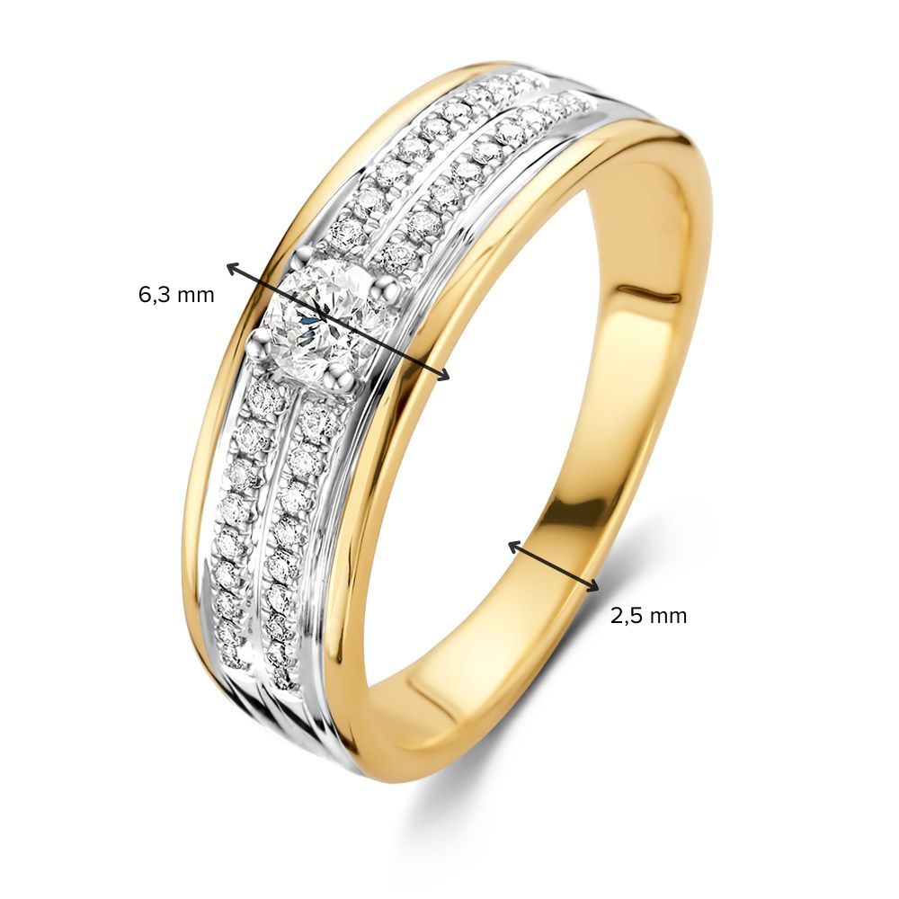 Bague en or bicolore élégante avec diamant brillant central 0.34 crt.