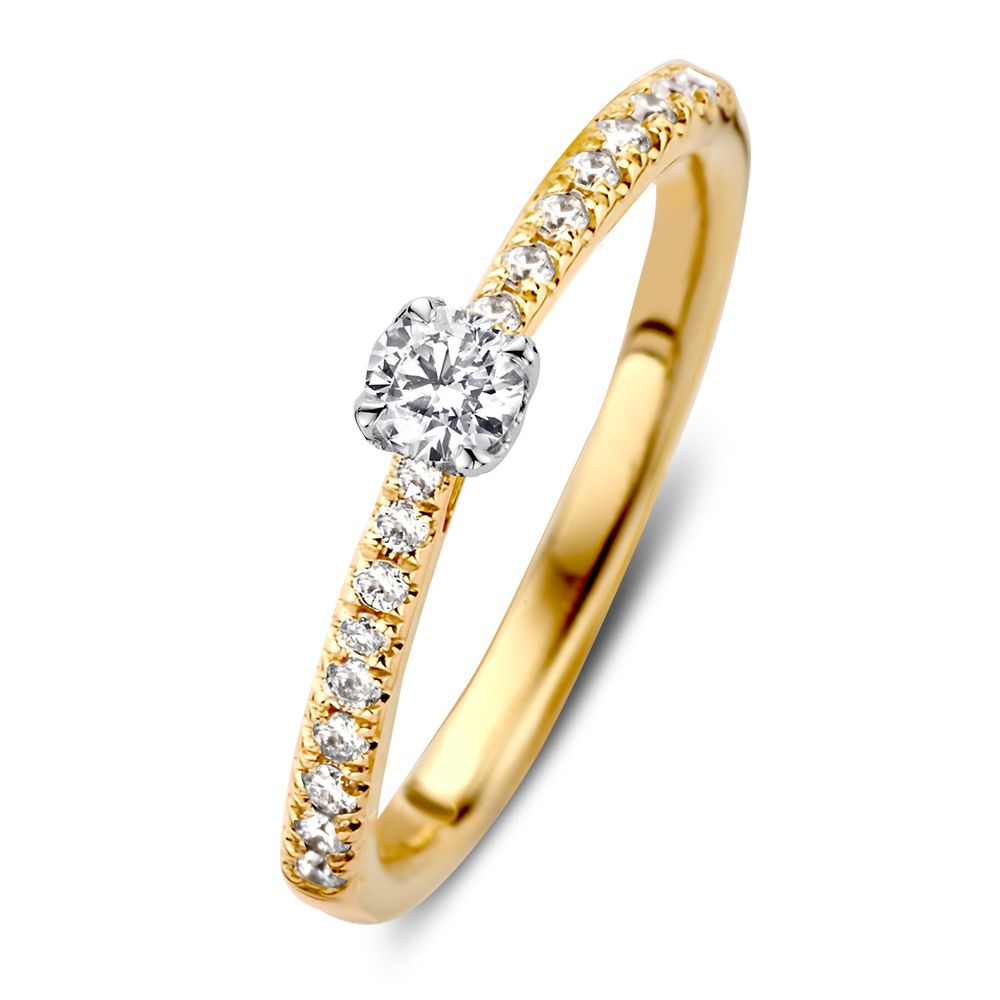 Bague bicolore élégante avec un diamant taillé en brillant de 0,35 ct.