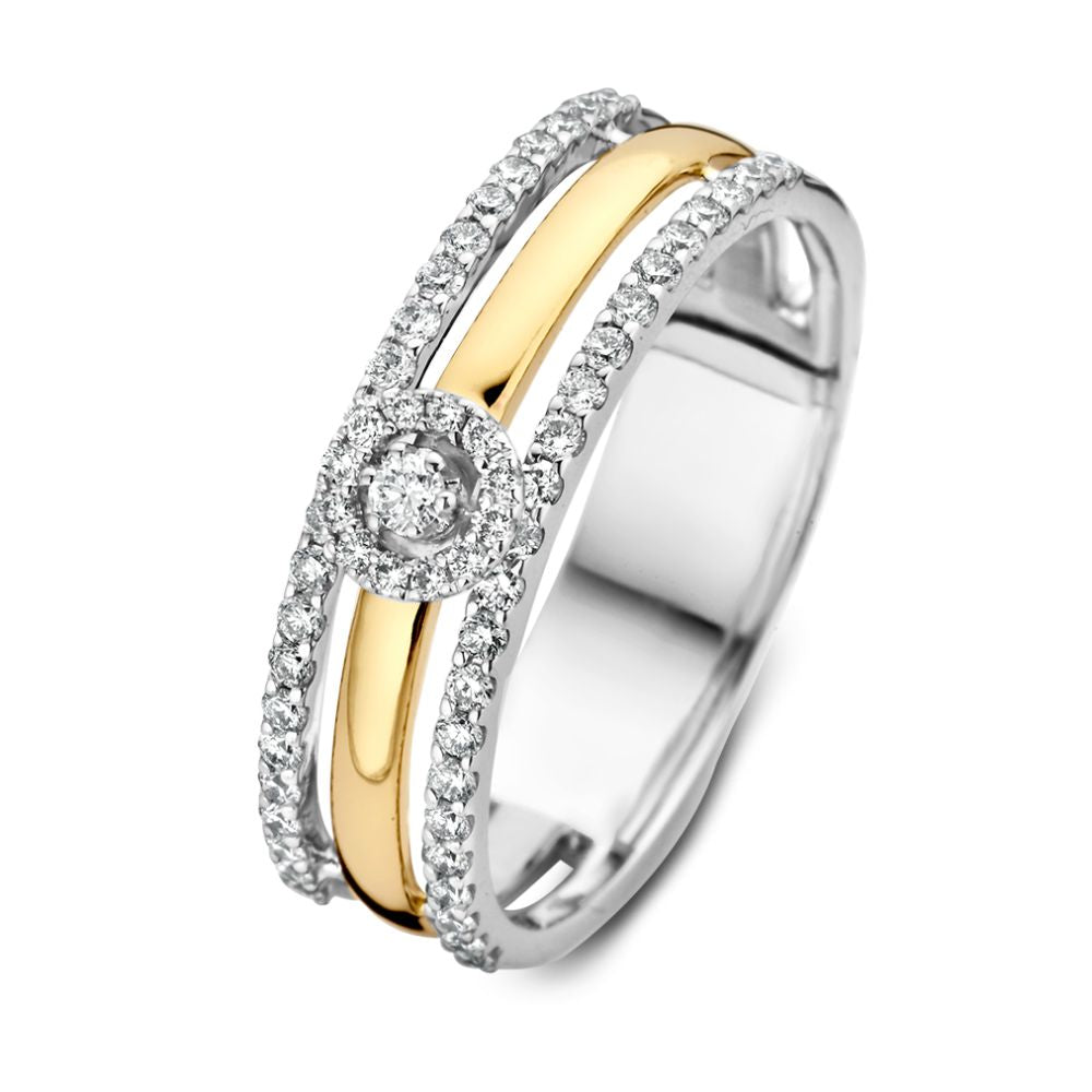 Bague large en or jaune et argent, ornée d'un effet solitaire et de diamants.