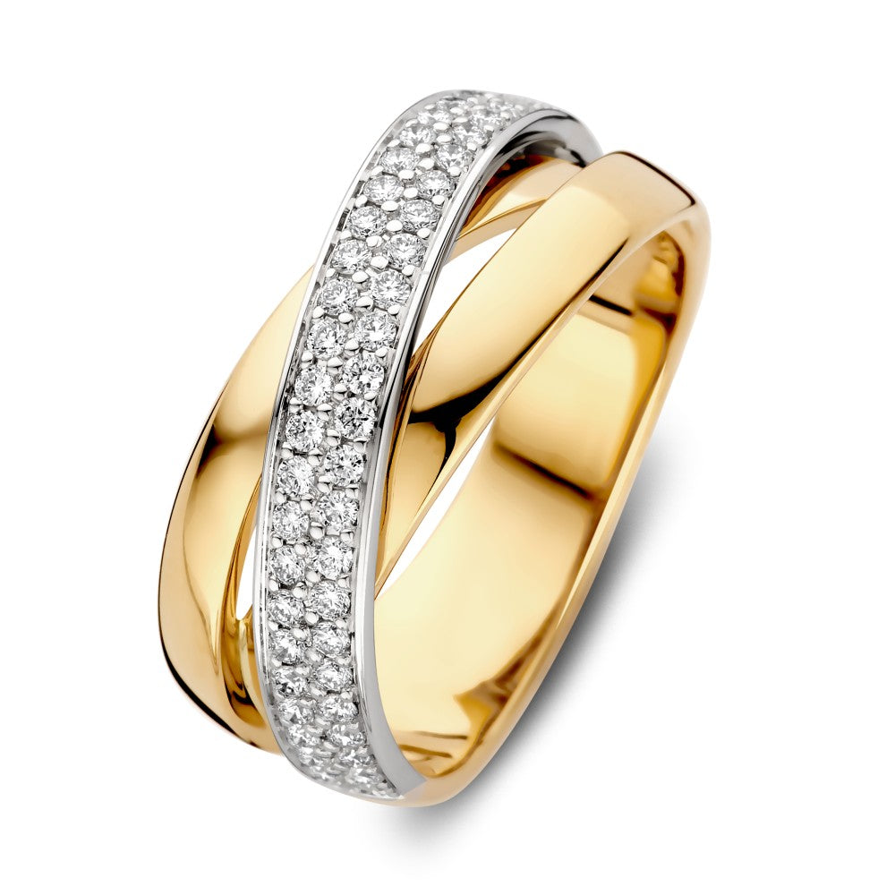 Bague en or jaune avec un bandeau en or blanc serti de diamants brillants.