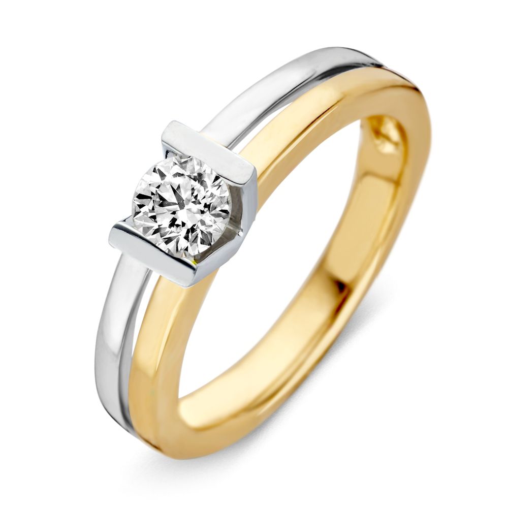 Bague bicolore en or avec un diamant de 0,41 ct, 14 carats.