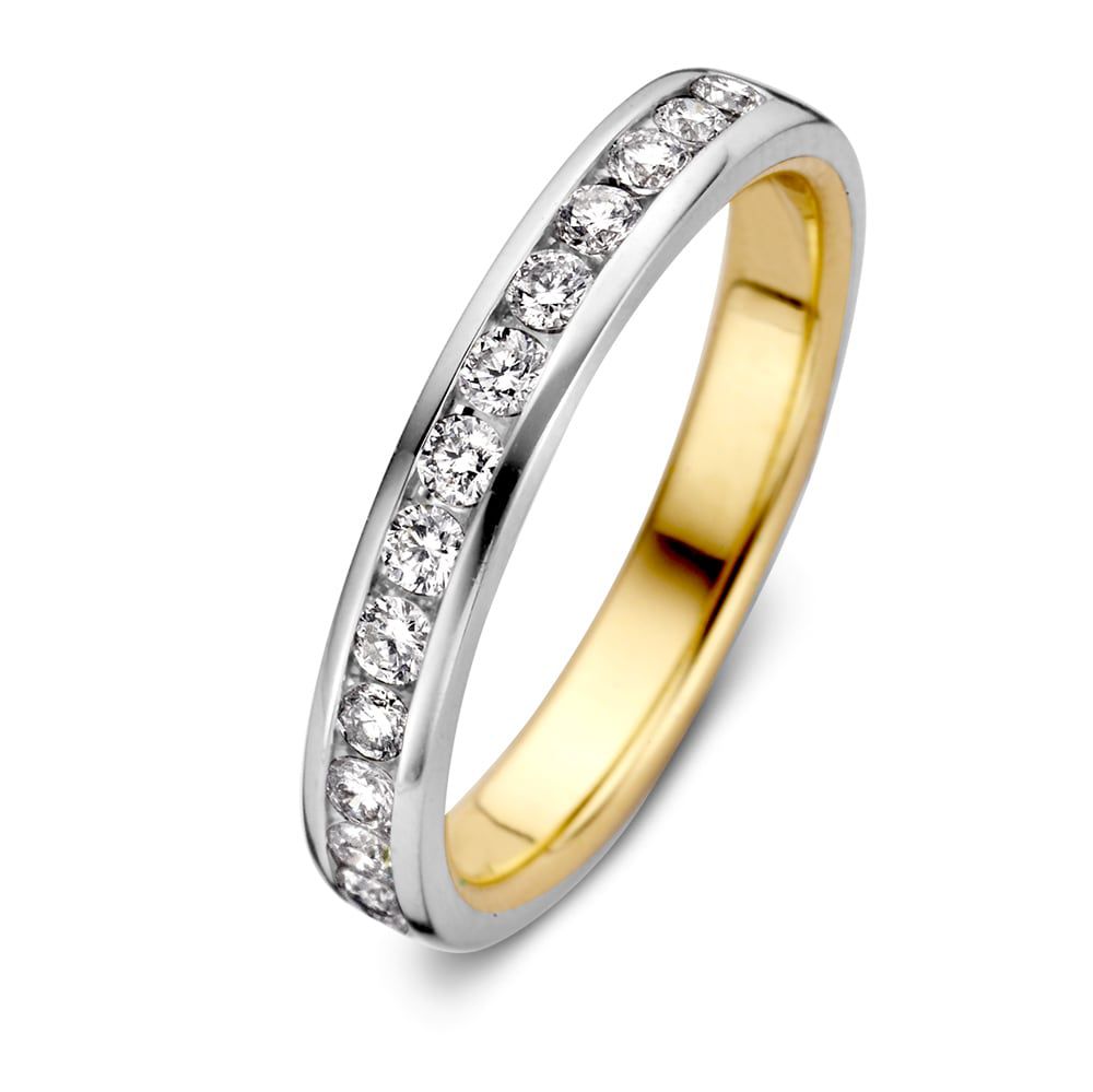 Bague bicolore en or blanc et jaune avec diamants (0,48 ct) en taille brillant.