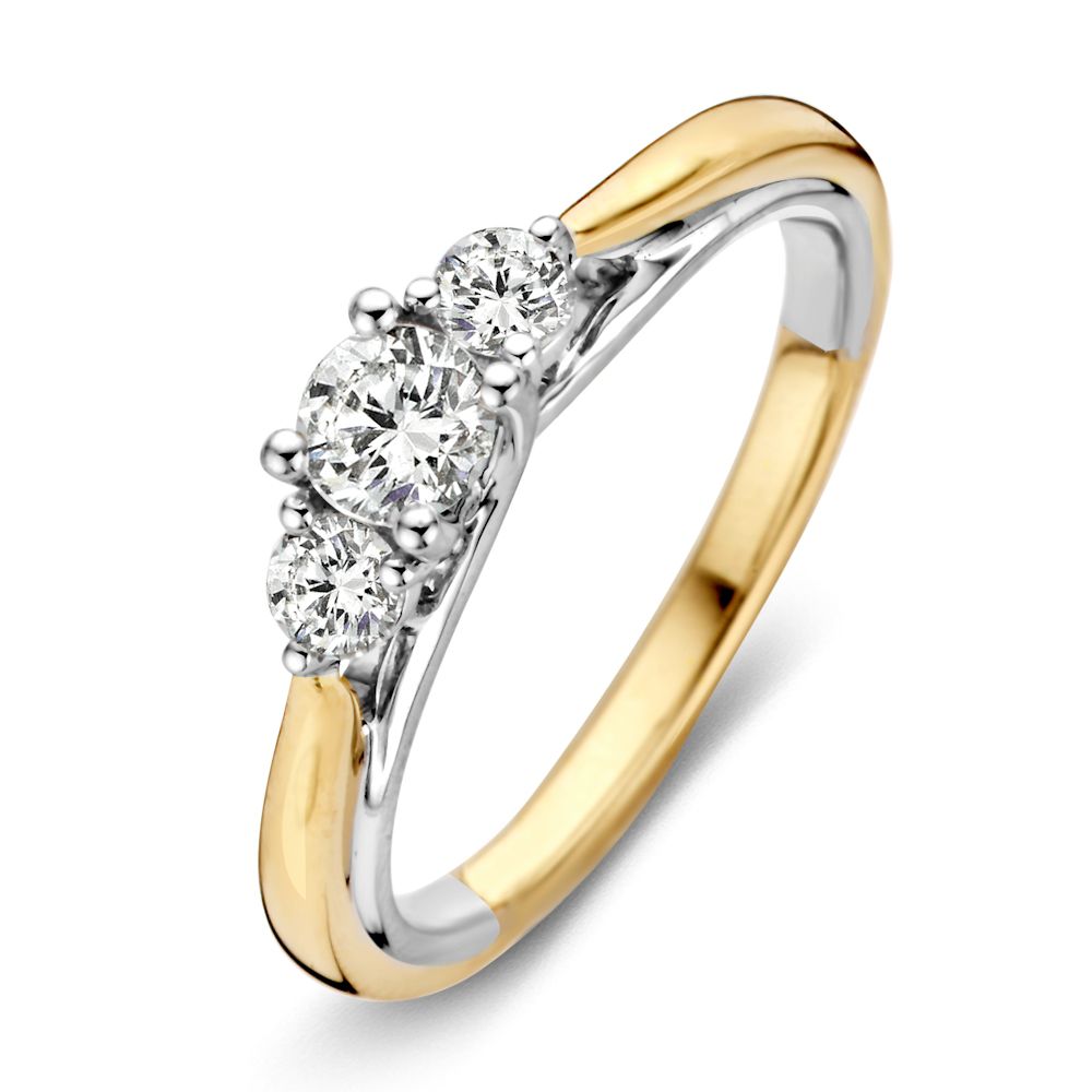 Bague bicolore en or jaune et blanc avec trois diamants de 0,51 ct.