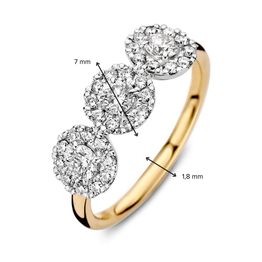 Bague trois pierres en or bicolore avec diamants 0.81ct H/SI-1 14 carats
