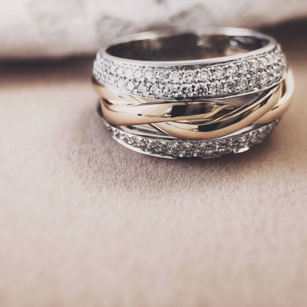 Bague en or bicolore avec diamant brillant 0.87ct H/SI-1 14 carats
