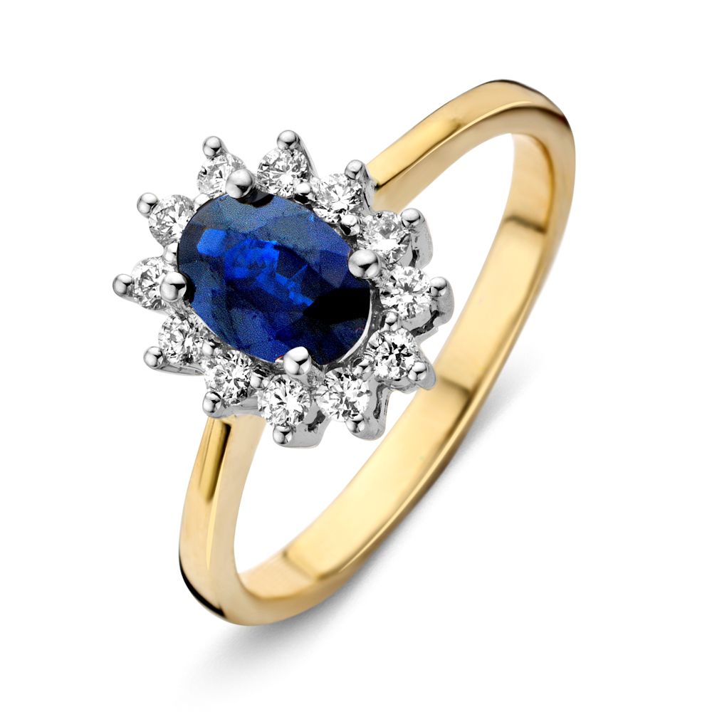 Bague en or jaune 14 carats ornée d'un saphir bleu ovale et de diamants brillants.