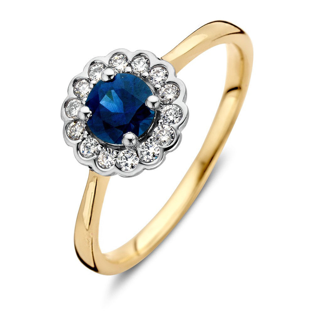 Bague en or classique avec un saphir bleu rond et des diamants de 0,18 ct.