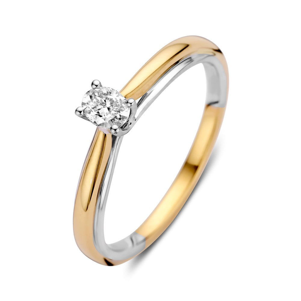 Bague en or bicolore 14 carats avec un diamant ovale de 0,19 ct.