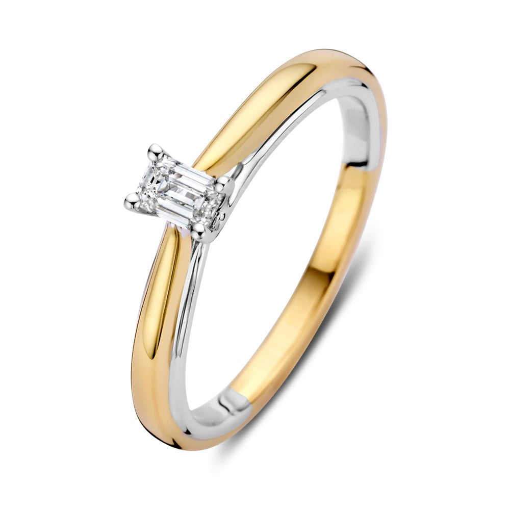 Bague en or bicolore avec diamant taille émeraude de 0,22 ct.