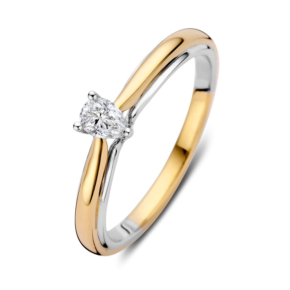 Bague solitaire en or bicolore avec un diamant en forme de poire de 0,23 ct.
