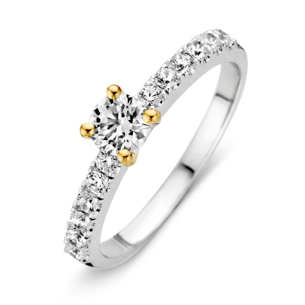 Bague bicolore en argent avec zircons, ornée d'un serti de pierres brillantes.