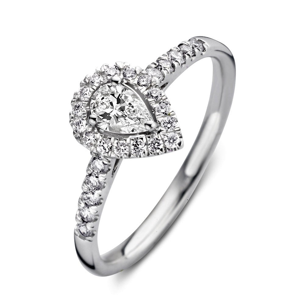 Bague en or blanc avec un motif en forme de poire, sertie de diamants brillants.