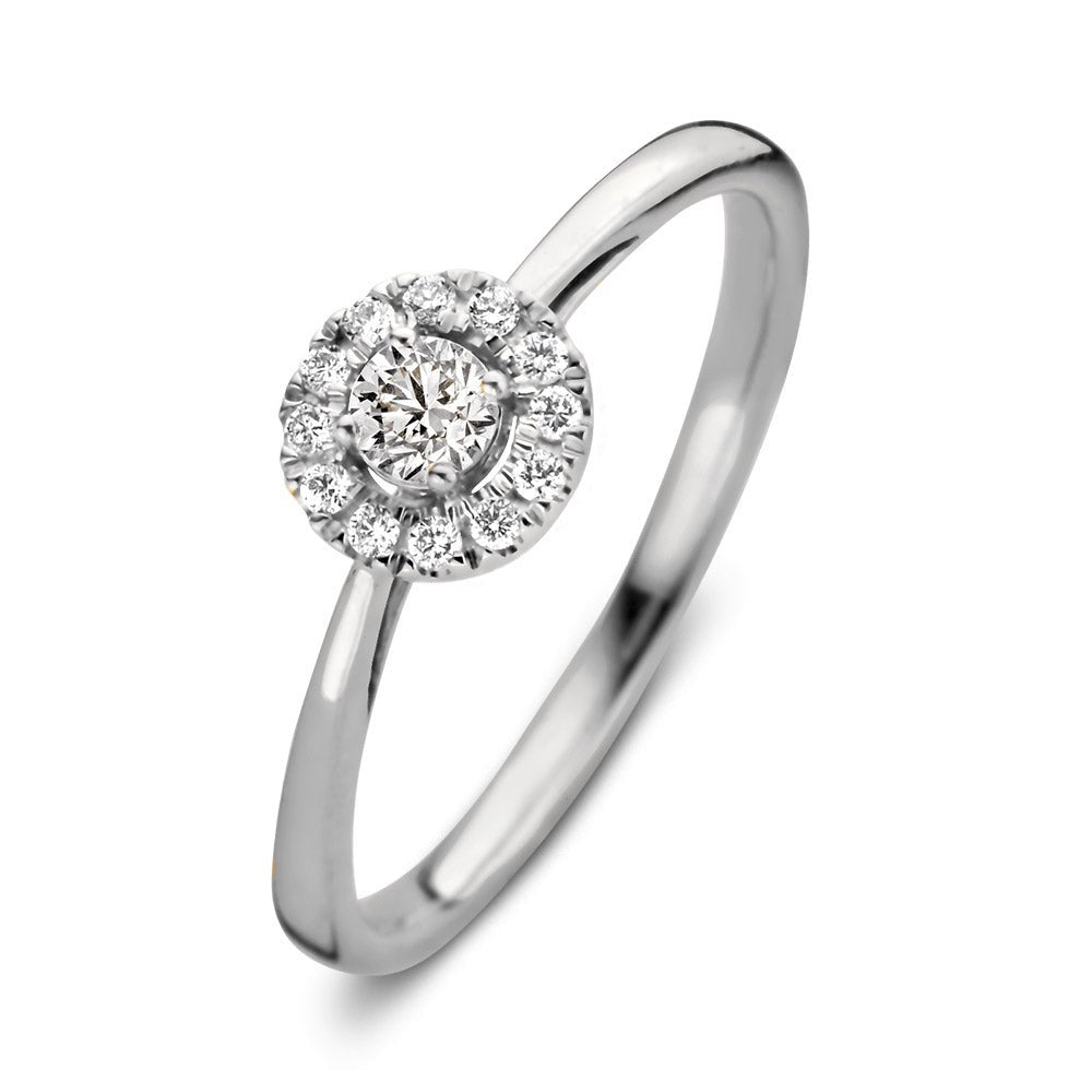 Bague en or blanc avec un motif rond serti de diamants brillants.