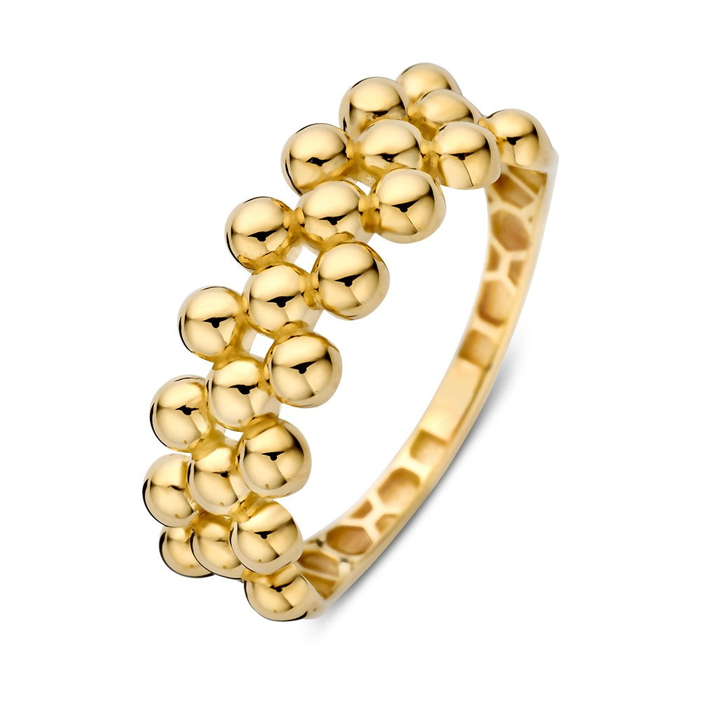 Bague en or jaune avec des sphères brillantes disposées en rangées.