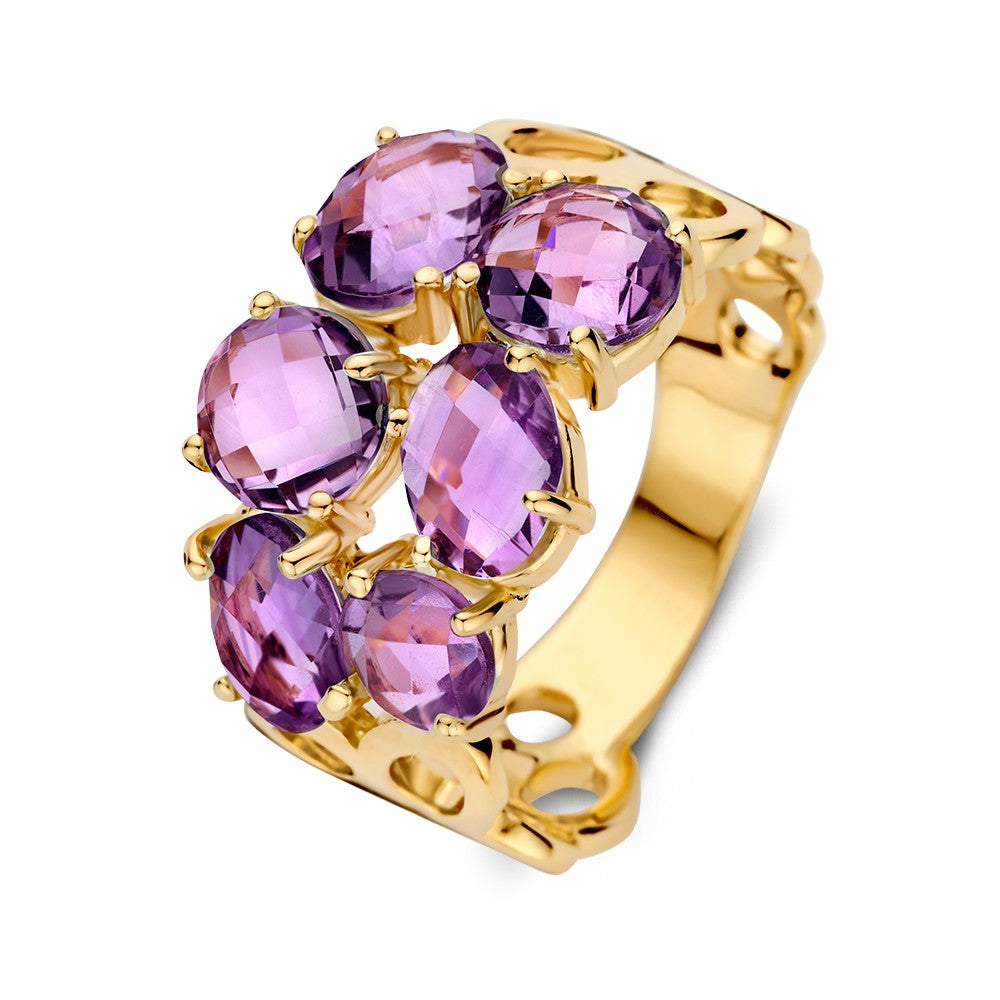 Bague en or jaune unique avec un motif organique et des améthystes violettes.